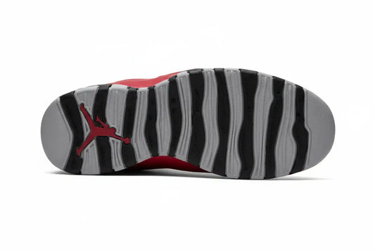 Air Jordan 10 “Bulls Over Broadway” – Gym Red/Black/Wolf Grey | AJ10 outsole view showing black and grey patterned design.