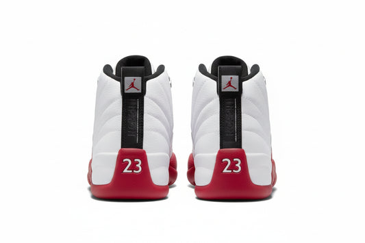 Air Jordan 12 “Cherry” Sneakers in White/Black/Varsity Red, rear view showcasing the iconic design and number 23.