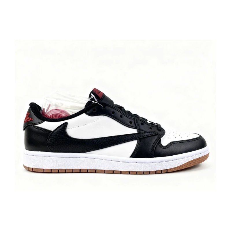 Nike Travis Scott x Air Jordan 1 Low OG "Panda" Sneakers in Black/White with reverse Swoosh and red accents