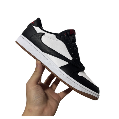 Nike Travis Scott x Air Jordan 1 Low OG "Panda" Sneakers in Black/White with reverse Swoosh and red accents