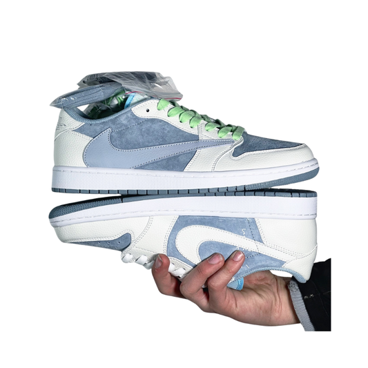 Nike Travis Scott x Nike Air Jordan 1 Low "Blue and Gray" Sneakers showcasing light-blue and grey suede overlays.
