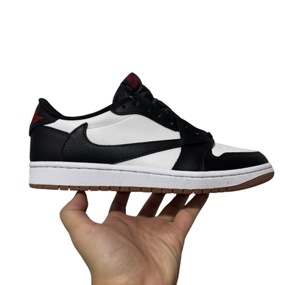 Nike Travis Scott x Air Jordan 1 Low OG "Panda" Sneakers in Black/White with reverse Swoosh and red accents