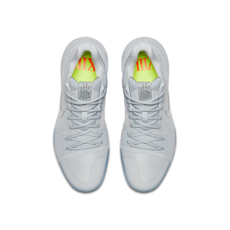 Nike Kyrie 3 "Time to Shine" Basketball Shoe with chrome Swoosh, translucent icy-blue outsole, and white upper with multi-color details for traction.