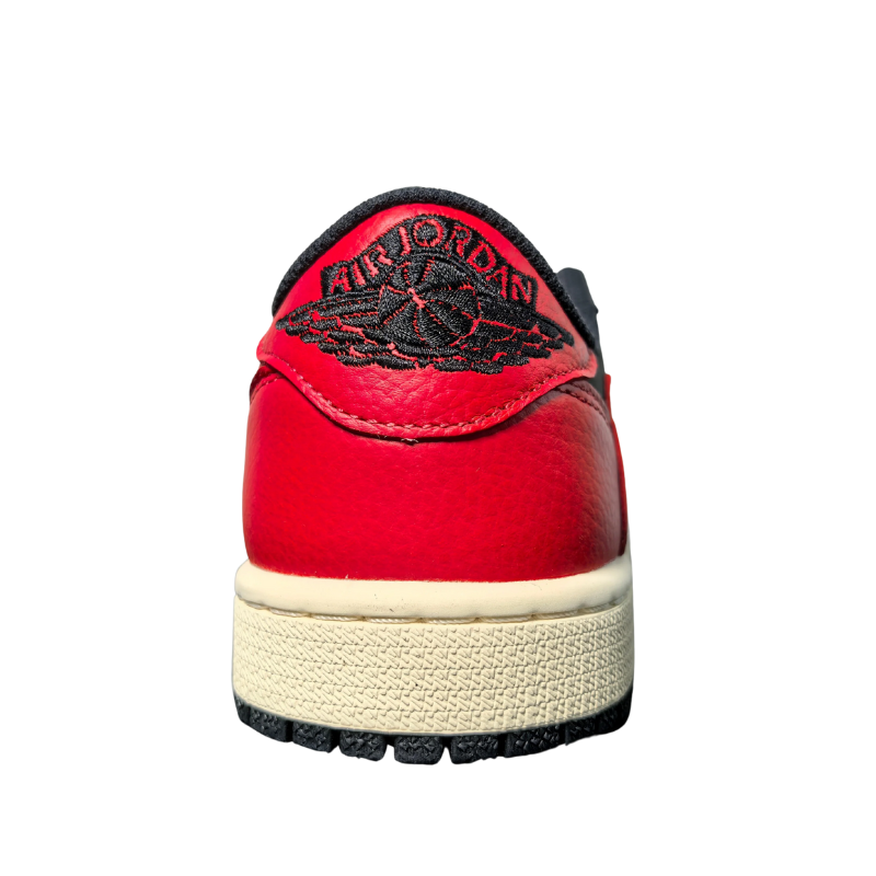 Nike Travis Scott x Air Jordan 1 Low Bred Sneakers back view with red leather and black outsole.