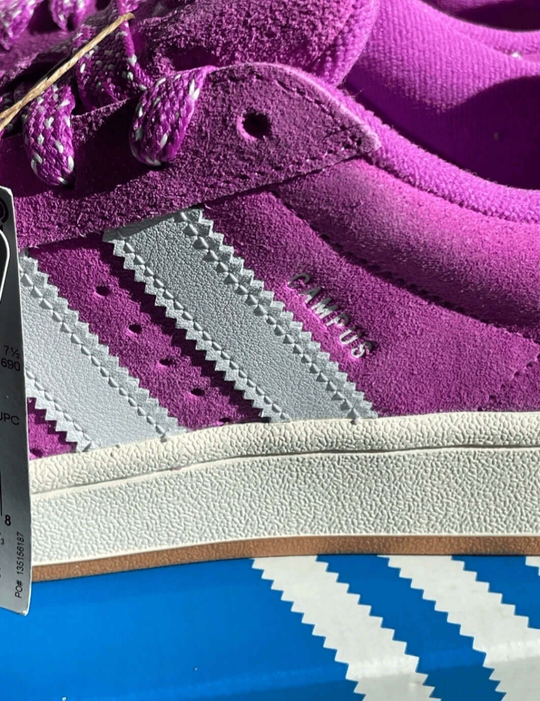 Adidas Campus 00s Women’s Sneakers in bold Purple Burst suede with white three stripes.