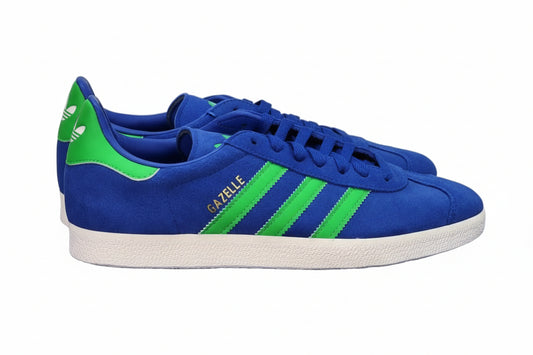 Adidas Gazelle Men's Shoes in blue and green on a blue Adidas box, showcasing retro athletic style.