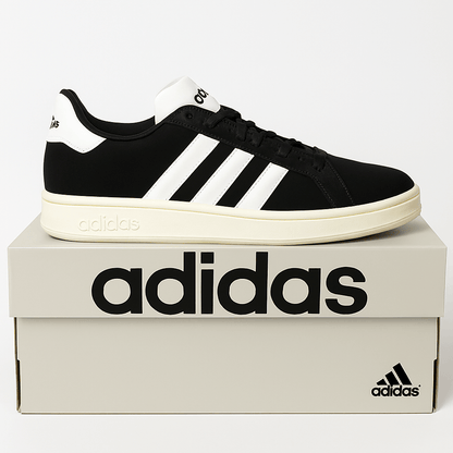 Adidas Grand Court Alpha 00s Men's Tennis Sneakers in black and white on an Adidas shoebox.