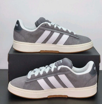 Adidas Grand Court Alpha sneakers in gray and white, stylish casual shoes on a box.