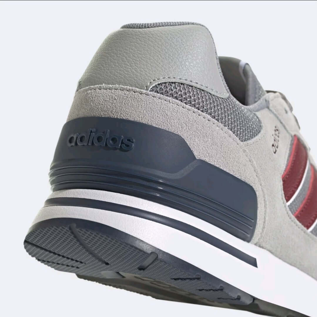 Adidas Run 80s men shoes showing retro design with grey upper and shadow red accents for everyday comfort.