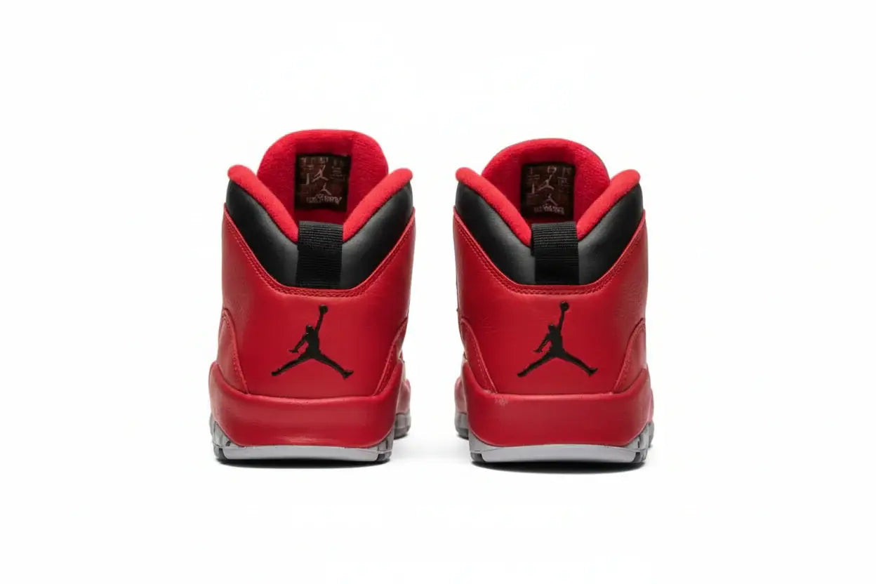 Air Jordan 10 “Bulls Over Broadway” – Gym Red/Black/Wolf Grey | AJ10 rear view with red leather and black accents.