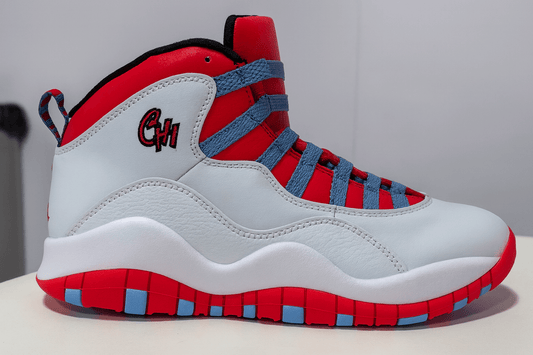 Air Jordan 10 Retro “Chicago Flag” side view showcasing bold colors and iconic design.