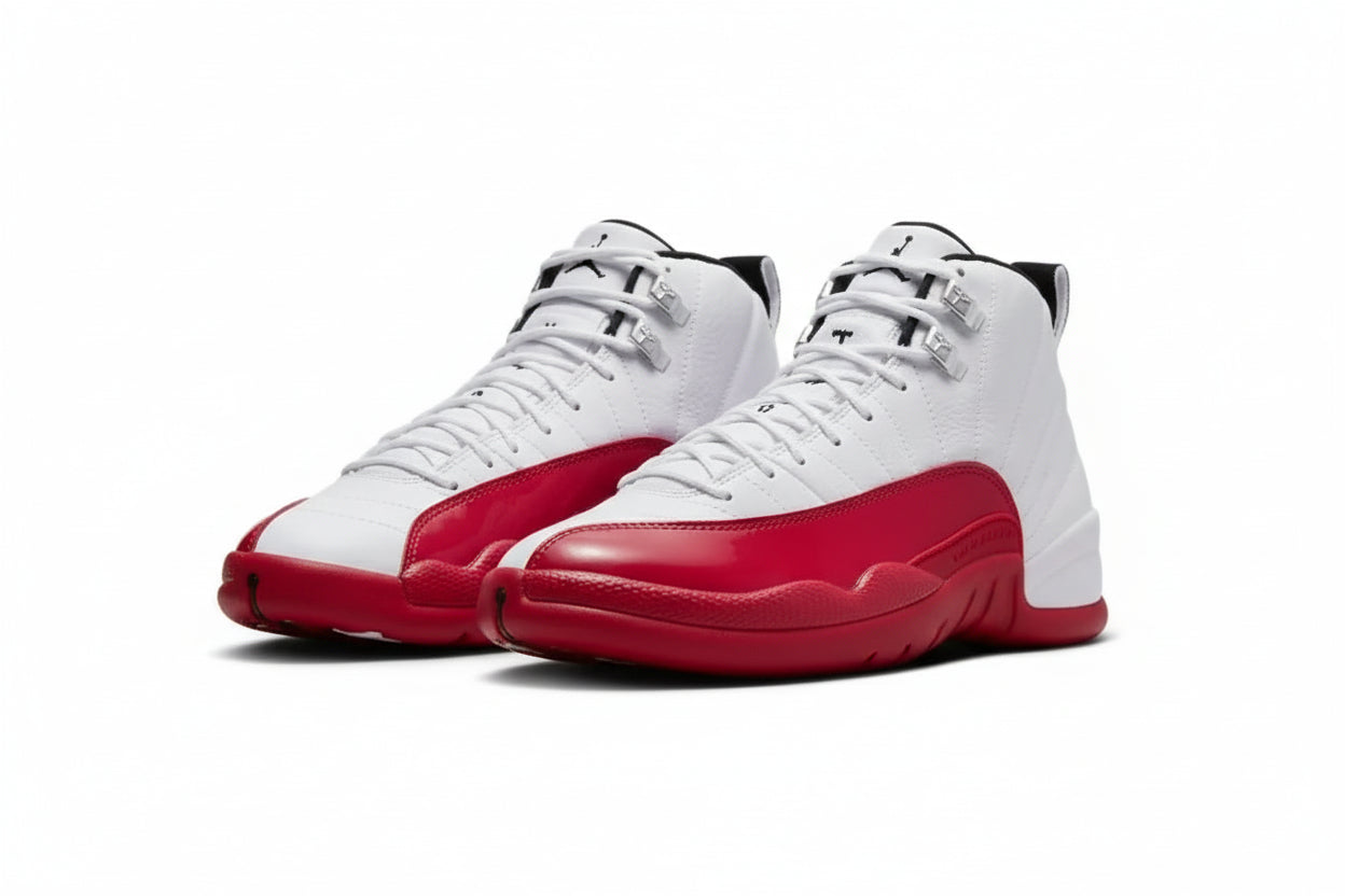 Air Jordan 12 “Cherry” Sneakers in White, Black, and Varsity Red showcasing a classic retro design.