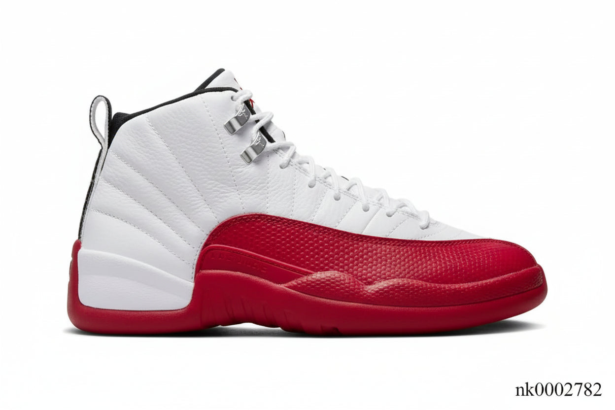 Air Jordan 12 “Cherry” Sneakers in White, Black, and Varsity Red side view showing iconic retro design.
