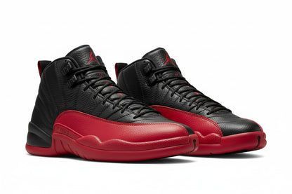 Air Jordan 12 “Flu Game” – Black/Varsity Red | AJ12 Retro sneakers featuring black leather and bold red accents.