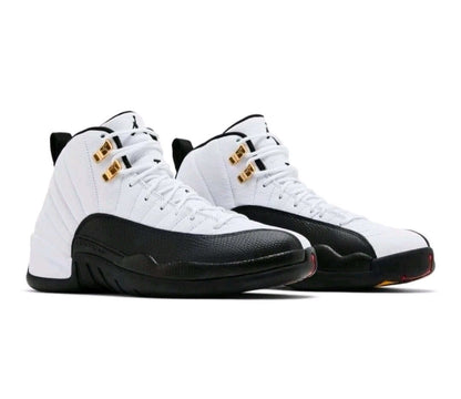 Air Jordan 12 “Taxi” sneakers featuring iconic black-and-gold detailing and a classic retro design.
