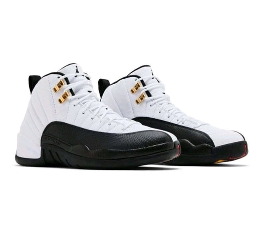 Air Jordan 12 “Taxi” sneakers featuring iconic black-and-gold detailing and a classic retro design.