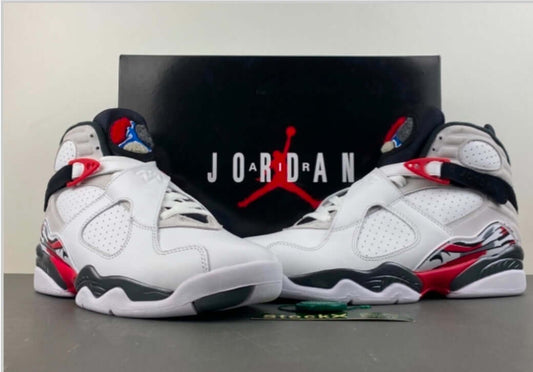 Air Jordan 8 Bugs Bunny – White / Black / Red sneakers displayed with the Jordan logo in the background.