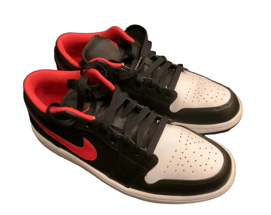 Air Jordan 1 Low Black White Fire Red sneakers showcasing bold color contrast and iconic design.
