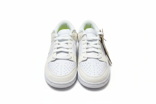 Nike Dunk Low Next Nature Sail White sneakers top view with clean white leather and lime green accents.
