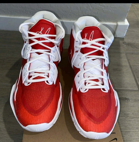 Kyrie 6 basketball sneakers size 14 in vibrant red and white, designed for agility and control on the court.